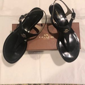 Gently worn Coach black wedge sandals